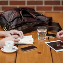 People discussing at the table